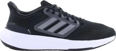 A side view of a black Adidas sneaker with a white sole.