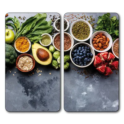 A collection of healthy foods arranged on a dark gray surface.