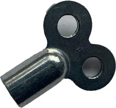 A close-up shot of a radiator vent key.