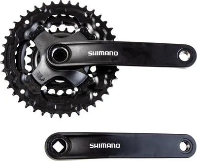 Produktbild von Shimano Tourney FC-TY301 Kettenradgarnitur dreifach 24/34/42 Zähne MTB Trekking, Farbe:schwarz, Zähne:42-34-24 Zähne, Ausführung:mit Kettenschutz, Kurbelarmlänge:150 mm