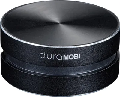 A close-up studio shot of a black Dura MOBI Bluetooth speaker.