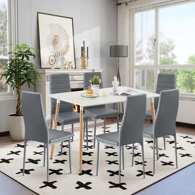 Immagine prodotto di Tavolo da pranzo rettangolare bianco, parte di un set, con 6 sedie grigio scuro