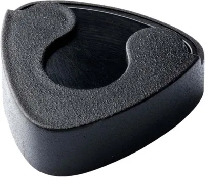 A black chisel holder on a white background.
