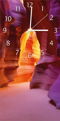 Produktbild von Wallario Design Wanduhr Felsschlucht in Arizona USA - orange und violett aus Echtglas, Größe 30 x 60 cm