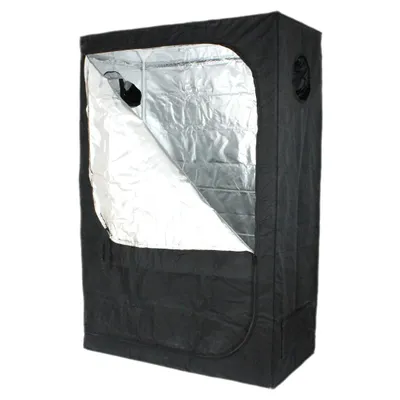A black grow tent with a reflective silver interior, partially open.