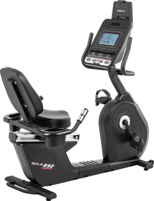 A black recumbent exercise bike is shown against a white background.