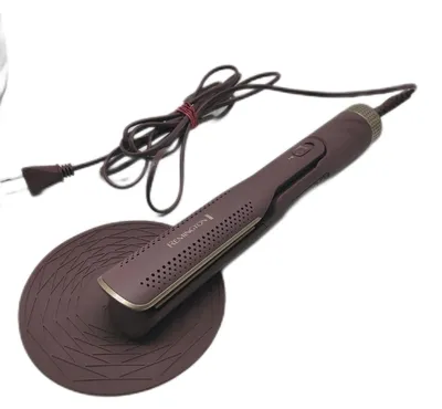 Produktbild von Remington AIRviveÃ¢¢ Airstyler 2-in-1 Glätteisen: Nass-Trockewendung Ionic