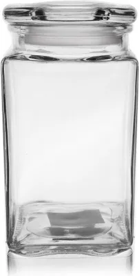A clear, studio shot of an empty glass jar with a lid.