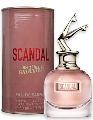A perfume bottle and its cylindrical packaging are displayed against a white background.