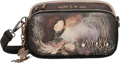 A close-up studio shot of a small, decorative handbag with a whimsical illustration and brand name.