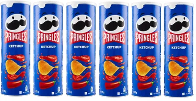 Six cans of Pringles Ketchup chips arranged in a row.