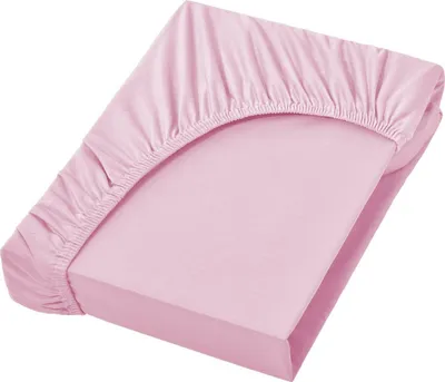 A pink fitted sheet is shown on a mattress.