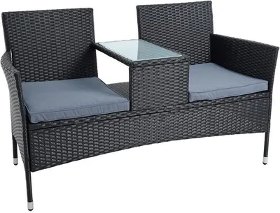 A black polyrattan garden bench with gray cushions and a glass-topped table in the center.