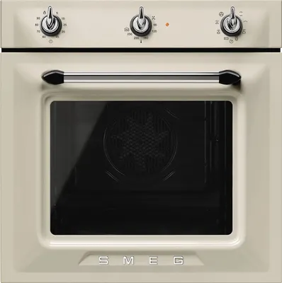 A front view of a cream-colored Smeg oven.
