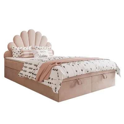 A pink upholstered bed with a shell-shaped headboard and patterned bedding, shown against a white background.