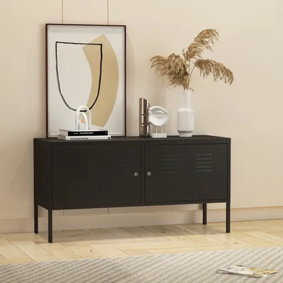 A black metal sideboard with two doors is displayed in a room with light beige walls and a wooden floor.