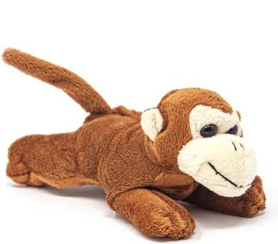 A plush toy monkey lying down on a white background.