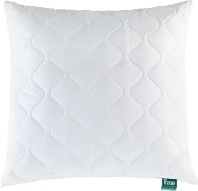 A white quilted pillow on a white background.