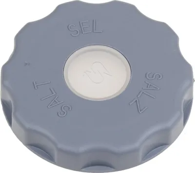 A close-up, top-down view of a gray plastic cap with white text and a white circular insert.
