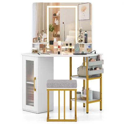 A white corner vanity desk with a lighted mirror, a stool, and various makeup products displayed on it.