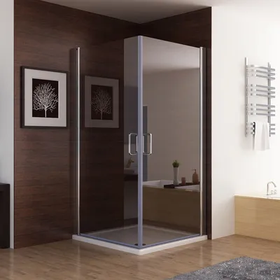 A modern bathroom with a glass shower enclosure.