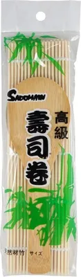 A sushi rolling mat set with a wooden spoon, packaged in plastic with bamboo and leaf graphics.
