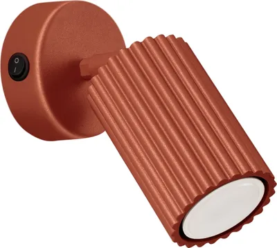 A close-up studio shot of a single wall light.