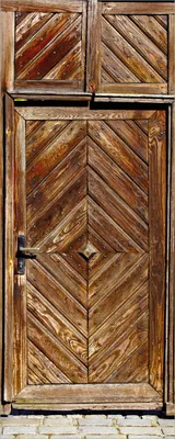 Produktbild von Wallario Poster - Alte Holztür mit diagonalem Muster, Kunstdruck Größe: 50 x 125 cm