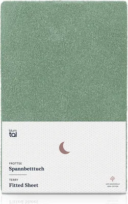 A product shot of a green fitted sheet with branding and product information.