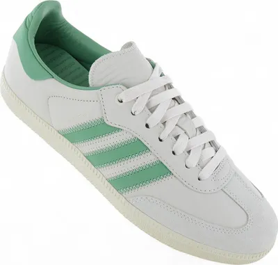 A single Adidas Samba sneaker with green stripes and accents on a white background.