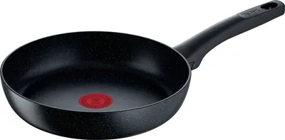 A frying pan is shown from a side angle against a white background.