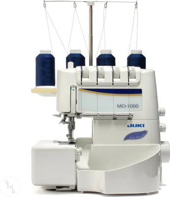 A white Juki MO-1000 overlock sewing machine with blue thread spools is shown against a white background.