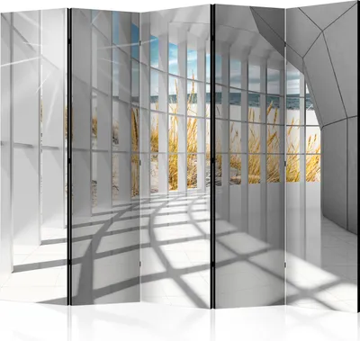 A decorative room divider with a beach and ocean view.