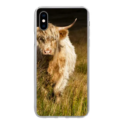 Produktbild von MuchoWow® Handyhülle Schutzhülle Hülle für iPhone Xs Schottische Highlander - Licht - Gras - Tiere Silikon Softcase Handy Hülle - Handytasche