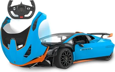 A blue remote-controlled Lamborghini Huracán STO toy car with its front hood open, and a remote control steering wheel above it, on a white background.