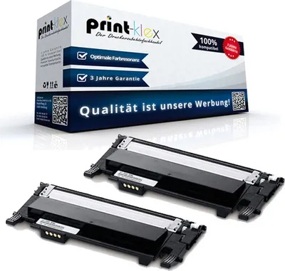 A product shot of two toner cartridges with their packaging in the background.