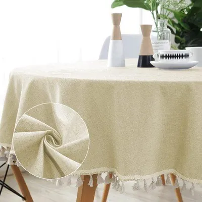 Produktbild von Unyqoos® Runde Tischdecke Ø150 cm, Beige – Slub-Hanf, abwaschbar & knitterfrei, mit Quasten, für Innen & Außen (Esstisch, Garten)