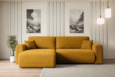 A mustard yellow sectional sofa is shown in a well-lit room with minimalist decor.