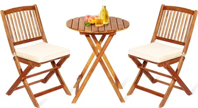A wooden bistro table and two chairs set on a white background.