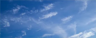 Produktbild von Wallario selbstklebendes Poster - Blauer Himmel mit vereinzelten Wolken, Größe: 50 x 125 cm