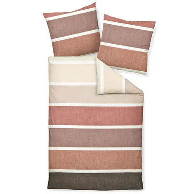 A bedding set with two pillowcases and a duvet cover, laid out flat on a white background.