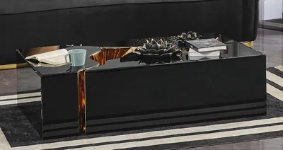 Produktbild von Casa Padrino Luxus Couchtisch Schwarz / Gold 110 x 70 x H. 43 cm - Rechteckiger Wohnzimmertisch - Wohnzimmer Möbel - Luxus Möbel - Luxus Einrichtung - Wohnzimmer Einrichtung