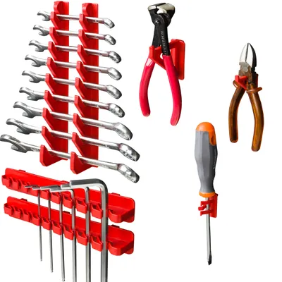 A collection of tools, including wrenches, pliers, a screwdriver, and hex keys, neatly organized on red holders against a white background.
