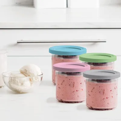 Produktbild von Allecto Premium - Set von 4 Ersatzbehältern für Ninja CREAMi - Eismaschinenbehälter mit buntem Deckel - Spülmaschinenfest - BPA-frei - Originalserie