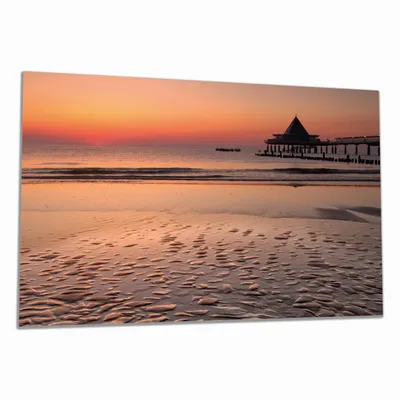 Produktbild von Wallario Herdabdeckplatte aus Glas, Größe 80 x 52 cm 1-teilig, Motiv Strand am Abend - Seebrücke am Ostseebad Heringsdorf