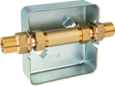 A plumbing fitting assembly mounted in a metal box.