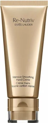 A close-up studio shot of a gold-colored tube of Estée Lauder Re-Nutriv Intensive Smoothing Hand Creme against a white background.