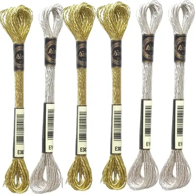 Produktbild von 6 Stück Sticktwist Kreuzstichfäden, 8m Stickgarn Gold Metallic, 12-fädiges Stickgarn Set in Goldfarbe für Bastelarbeiten, Kreuzstich, Nähprojekte und kreative Handarbeiten mit Faden Fee Nadel