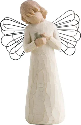A carved angel figurine with wire wings.