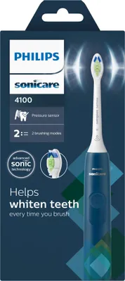The image shows the packaging of a Philips Sonicare electric toothbrush.